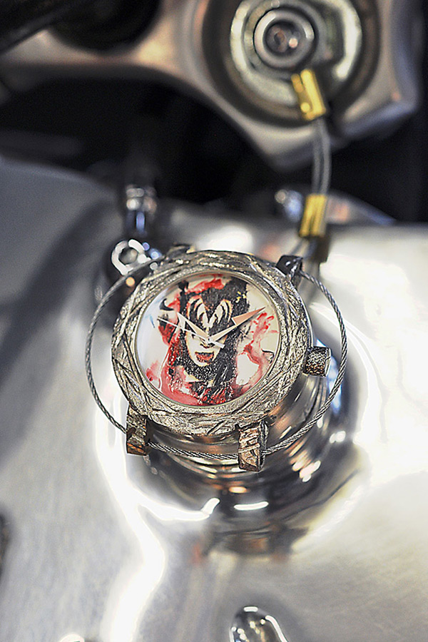 The customized Harley Davidson tank cap and KISS watch
